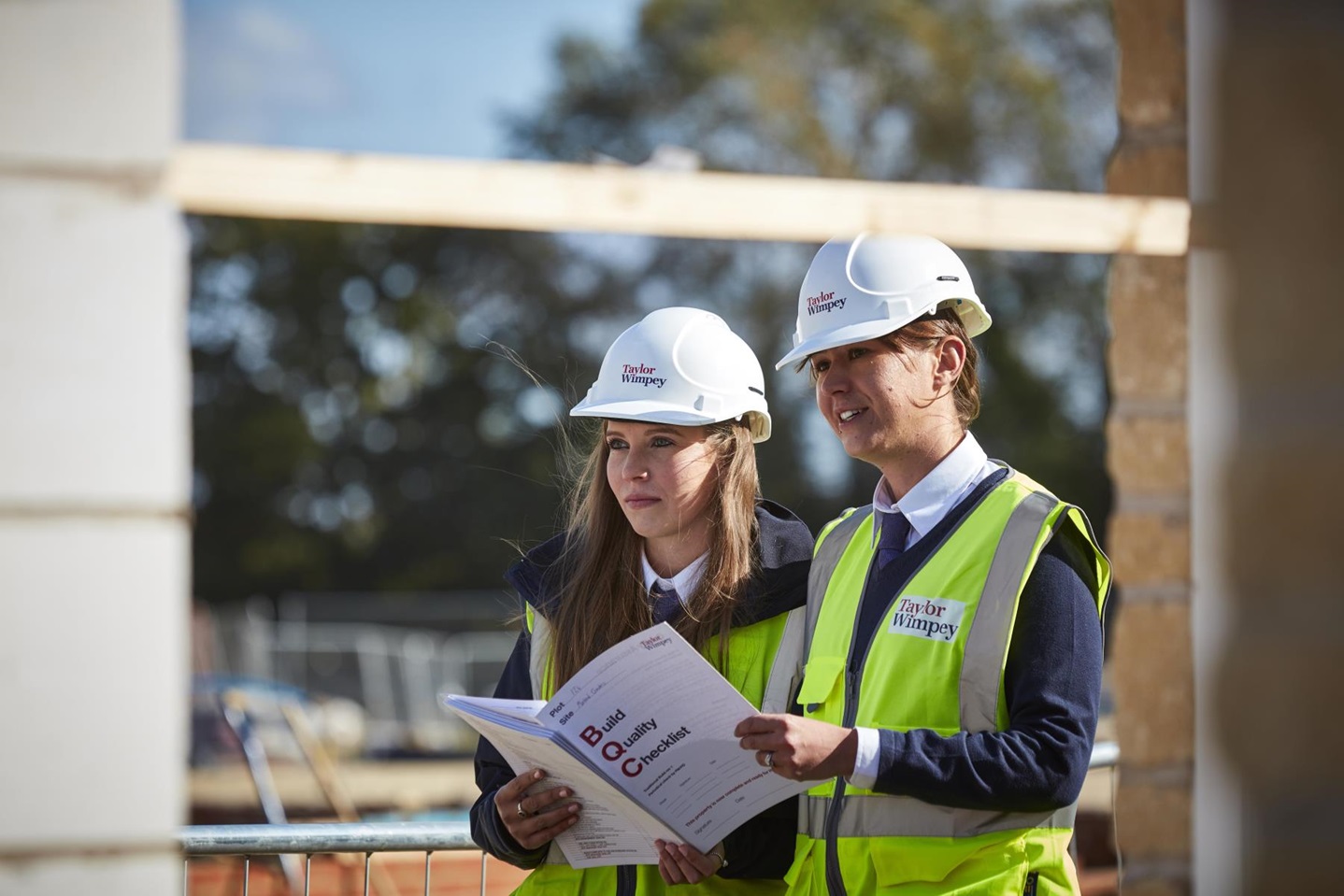 Construction staff checking quality